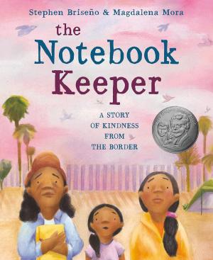 Woman holds a notebook while standing next to a girl and her mother at the border