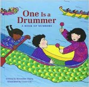 A diverse group of children in a canoe